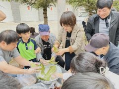 文兴社区端午佳节聚邻里，红色联盟共筑情，粽香四溢暖人心，共绘和谐社区新